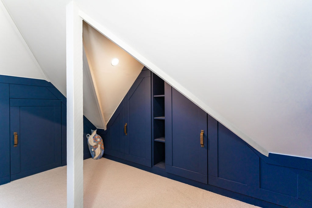 Dorking — A loft conversion and ground-floor coordination in Dorking